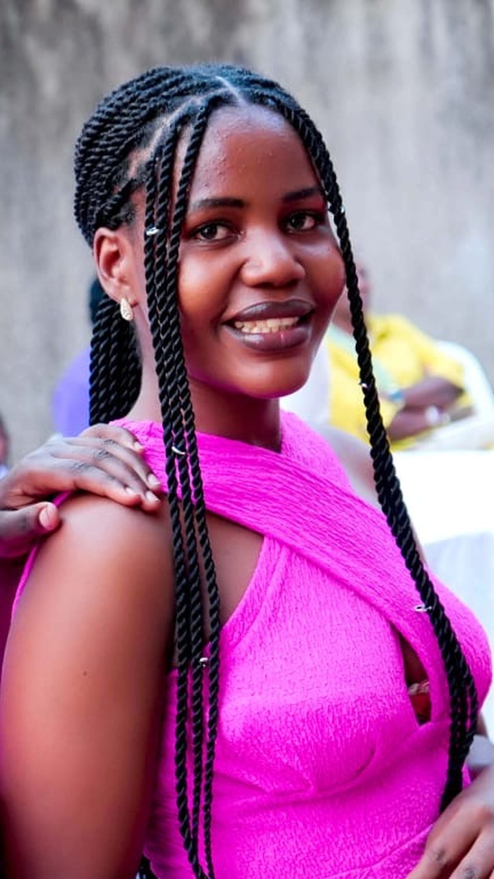 A Tshani Foundation graduate with fresh braids at a community event